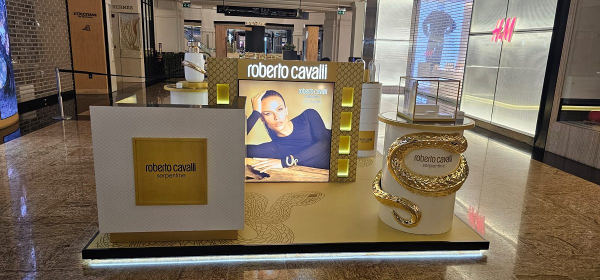 Gold display kiosk for boutique showcase