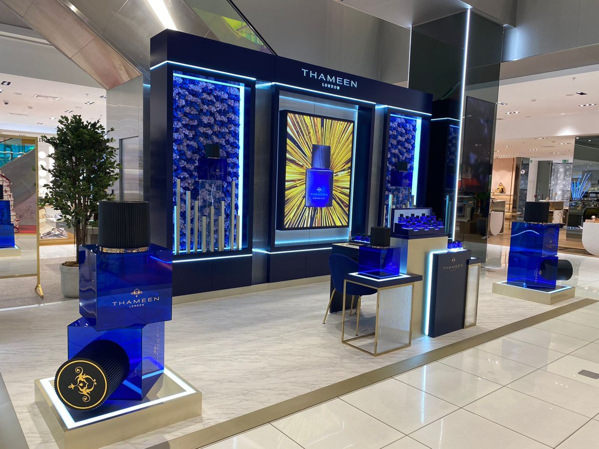 Custom kiosk structure with illuminated display